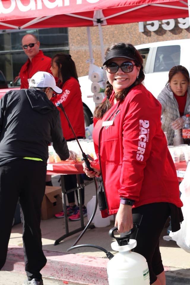 Photo of Monica volunteering at Pacer tent during L.A. Marathon